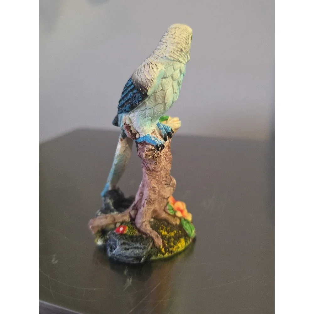Blue parakeet‎ Bird Figure on Branch
